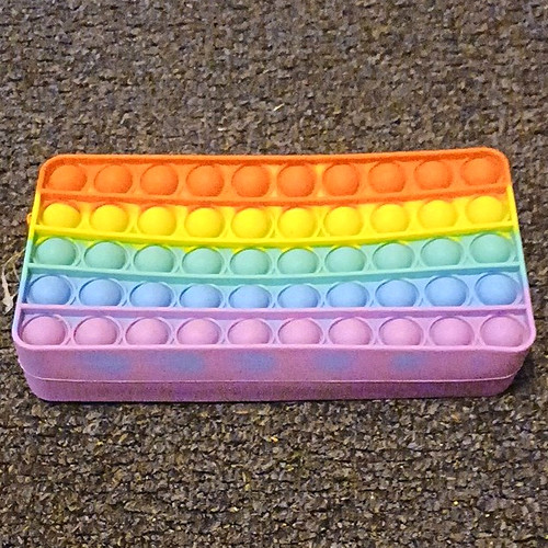 Rainbow pop silicone zip - it,
