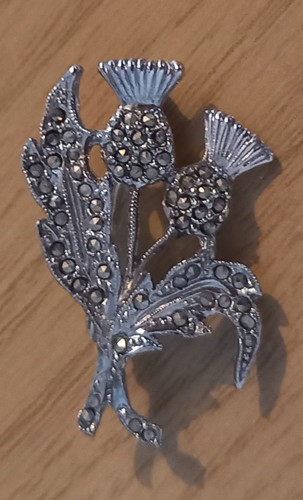 Thistle brooch with two - with,