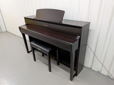 Yamaha Clavinova CLP-775 and stool in dark rosewood stock #25513