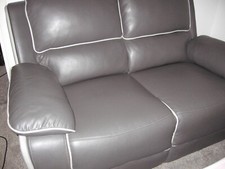 dark grey leather two seater recliner settee