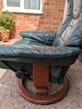 Ekornes stressless recliner chair and footstool in forest green leather