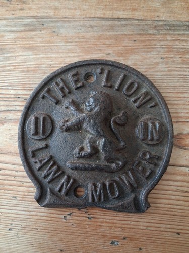 The lion lawnmower plaque - lion,