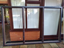 Brand New Rosewood On White Window Frames.  