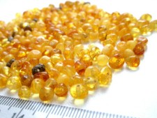 REAL BALTIC AMBER HOLED LOOSE