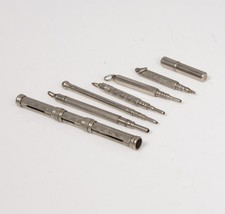 SIX WHITE METAL PROPELLING