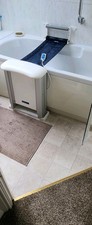 Bath chair Molly Maid. Used condition. Floor mounted.