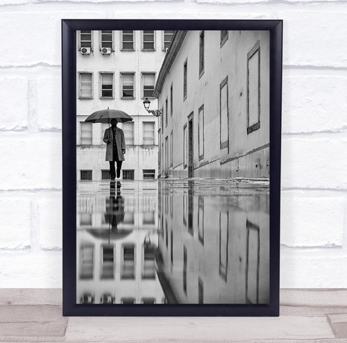 Man with umbrella reflection