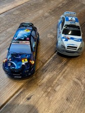 Two scalextric rally cars