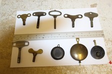 3 Old Clock Pendulums And 7