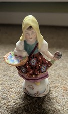 Pair of Porcelain Figures -