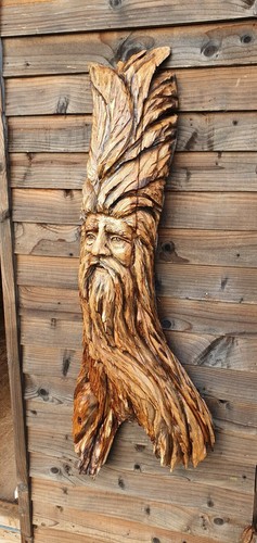 Chainsaw carved green man - chainsaw,