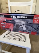 Air soft SIG 552 Commando rifle.  Spring Powered Soft Air. ￼