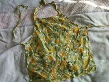 childrens apron, floral/leaf style design for a little girl VGC very small size 