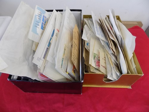 World stamps loose packets - in,