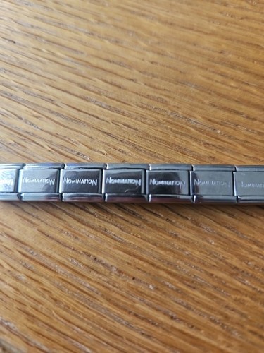 Genuine nomination stainless - genuine,