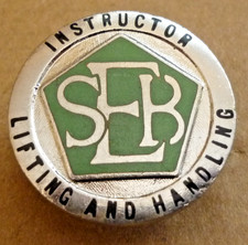 VINTAGE ENAMEL BADGE SEB CRANE