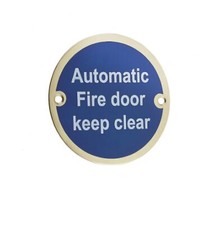 Automatic fire door keep clear