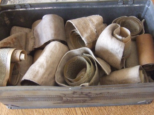 Antique tin rolls lace - of,