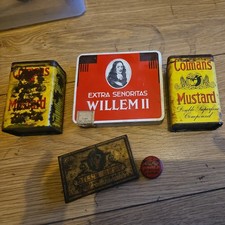 collection  of old tins mustard tobacco tins 