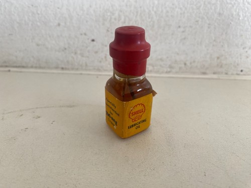 Triang shell oil - shell, glass