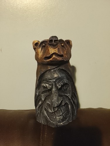 Hand carved wooden bear face - hand,
