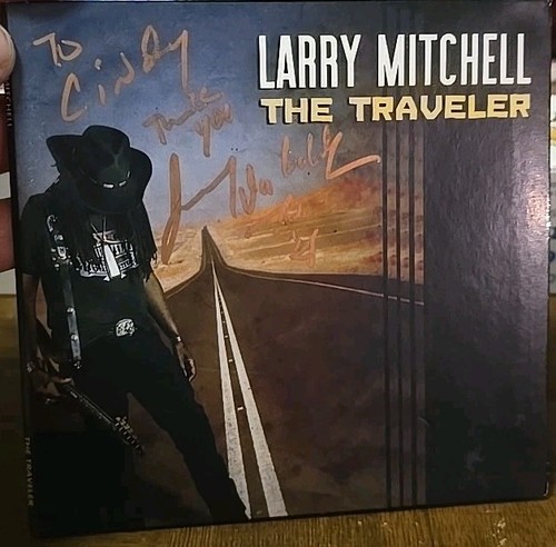 Larry mitchell the traveler - -,