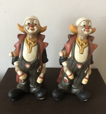 Pair of vintage ceramic clown figurines, juggling clubs