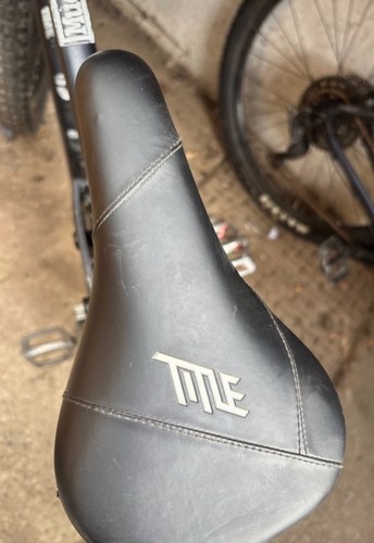Title saddle with tiny rip - title, at