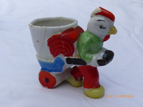 Vintage chicken pulling egg - vintage,