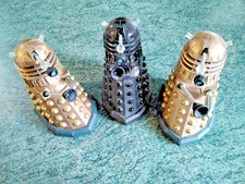 Three Dr Who Daleks 2 gold & 1 Black 5" High
