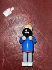 Blue Bowler Holding a Bowling