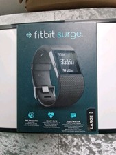 Fitbit Surge Wireless Fitness Tracker, Large - Black used once