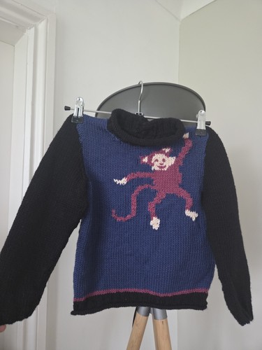 Childrens hand knitted monkey - hand,
