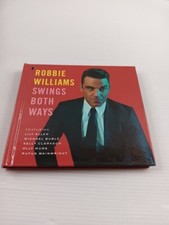 Robbie williams swings both - williams,