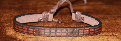 Brown leather geometric brick - leather,