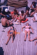 35mm Slide - Women In Bikinis Sunbathing On Deck Of Ship, Early 1960s
