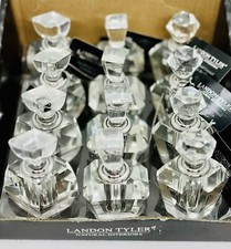 A Selection Of Landon Tyler Natural Interiors Clear Perfume Bottles.