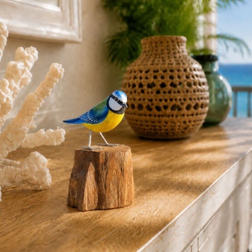 Blue tit hand - hand, carved