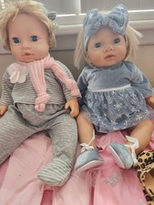 Tiny Treasure Bundle Of Dolls And Clothes