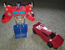 2 × Transformers Toys Cyberverse Optimus Prime Truck & Sideswipe 3 step Red Car