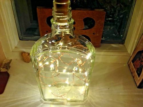 Vintage embossed glass bottle