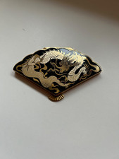 Unknown make of powder compact.