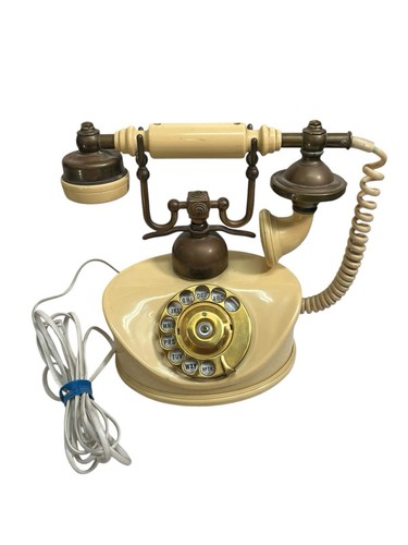 Cradle handset rotary dial