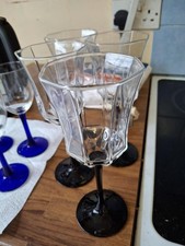 Set of 4 black stem glasses unusual shape