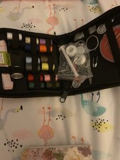 Small Sewing Machine With Buttons Thread Scissor And A Bay