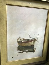 Row boat on calm waters with reflection on water. Nice display piece