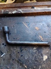 Vintage Ford 77FB17035AD wheel brace 