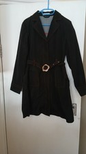 Short black raincoat with silver daisy belt by New Look