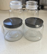 4 Empty Glass Containers With
