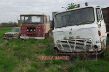 PHOTO  SCRAP VEHICLES DANES MOOR A COLLECTION OF OLD TRUCKS (AND A MERCEDES BENZ
